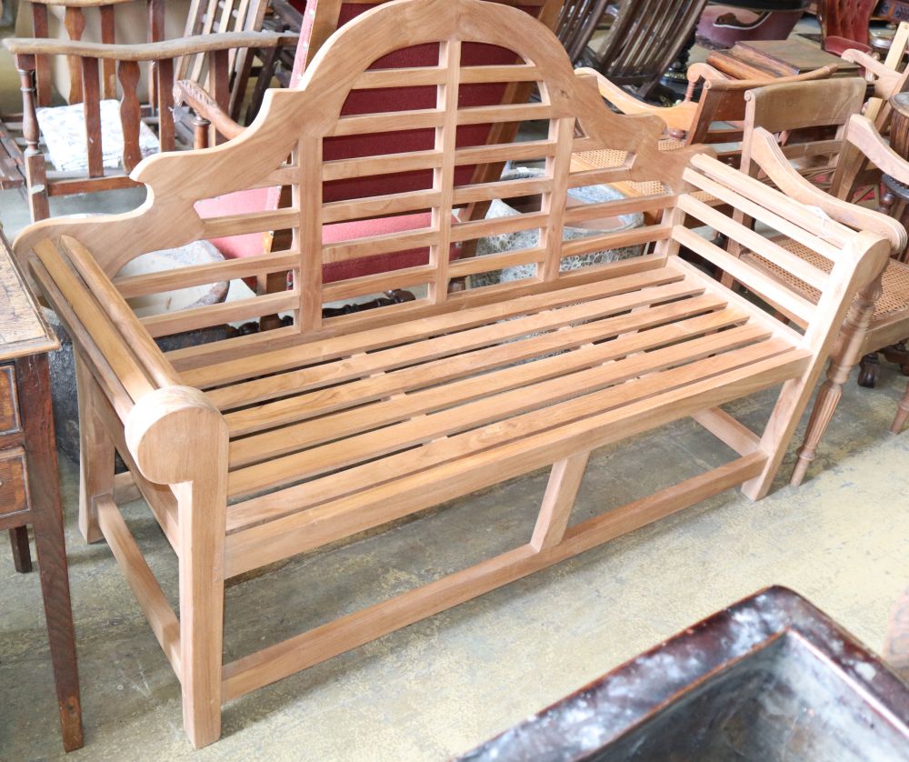 A Lutyens style teak garden bench, W.164cm, D.56cm, H.106cm